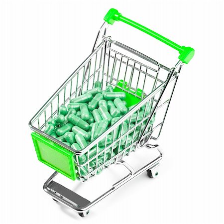 Carts on a white background filled with pills Stock Photo - Budget Royalty-Free & Subscription, Code: 400-05317123