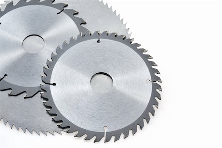 simsearch:400-04333451,k - Circular saw blades for wood isolated on white Photographie de stock - Aubaine LD & Abonnement, Code: 400-05317582