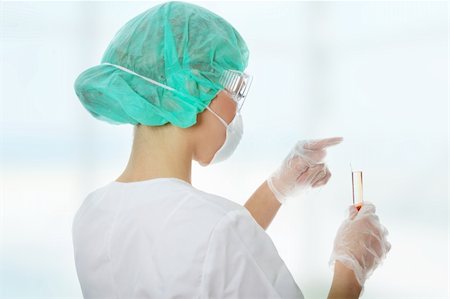 simsearch:400-04467890,k - Closeup portrait of female scientist ( biotechnologist ) Stockbilder - Microstock & Abonnement, Bildnummer: 400-05317625