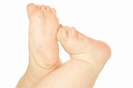 simsearch:400-04235194,k - newborn baby feet isolated on white Stock Photo - Budget Royalty-Free & Subscription, Code: 400-05318415