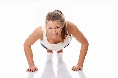 simsearch:400-04708096,k - Young woman doing exercise, isolated on white Stockbilder - Microstock & Abonnement, Bildnummer: 400-05318458