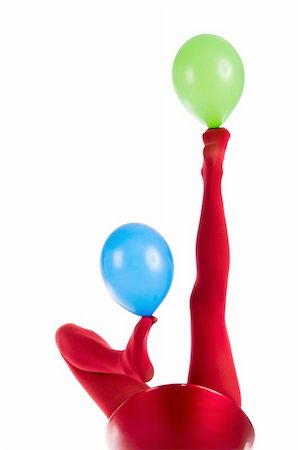 simsearch:400-04308604,k - Female feet in red stockings with balloons isolated in white Stock Photo - Budget Royalty-Free & Subscription, Code: 400-05318491