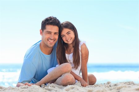 Father with his daughter on the beach Stock Photo - Budget Royalty-Free & Subscription, Code: 400-05318858