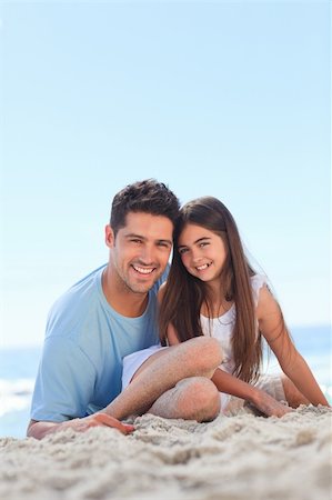Father with his daughter at the beach Stock Photo - Budget Royalty-Free & Subscription, Code: 400-05318859
