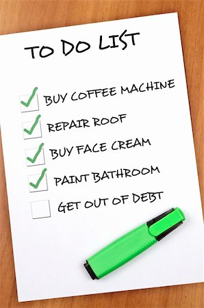 simsearch:673-06025373,k - To do list with Get out of debt not checked Stock Photo - Budget Royalty-Free & Subscription, Code: 400-05319058