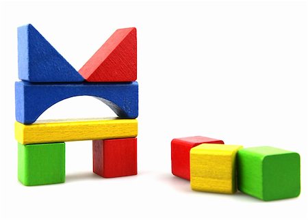 Wooden building blocks on white background. Close Up. Stock Photo - Budget Royalty-Free & Subscription, Code: 400-05319805