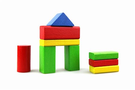 simsearch:400-04282061,k - Wooden building blocks on white background. Close Up. Stock Photo - Budget Royalty-Free & Subscription, Code: 400-05319824