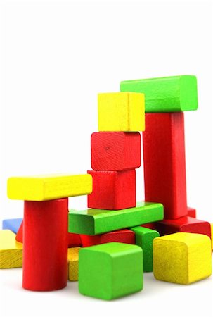 Wooden building blocks on white background. Close Up. Stock Photo - Budget Royalty-Free & Subscription, Code: 400-05319861