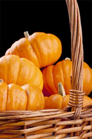 simsearch:400-05714074,k - Small orange pumpkins symbolising autumn holidays and used in decorative works. Foto de stock - Royalty-Free Super Valor e Assinatura, Número: 400-05319951