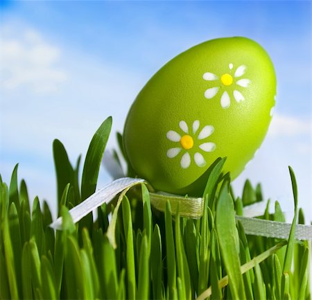 painted happy flowers - Hand painted Easter egg on a green grass Stock Photo - Budget Royalty-Free & Subscription, Code: 400-05319969
