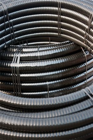 Close up of roll of cable in black plastic isolation Stock Photo - Budget Royalty-Free & Subscription, Code: 400-05310075