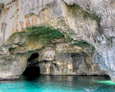 salento - Sea cave in salento in Pugllia Fotografie stock - Microstock e Abbonamento, Codice: 400-05310106
