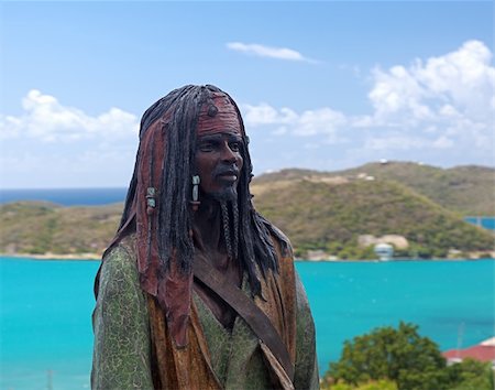 Pirate Jack Sparrow overlooks the harbor in Charlotte Amalie on the island of St Thomas in the US Virgin Islands Foto de stock - Royalty-Free Super Valor e Assinatura, Número: 400-05310226