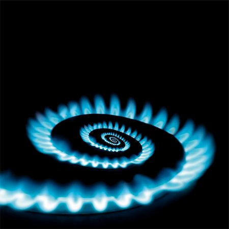 fire in gas stove - Conceptual vicious circle of energy crisis gas burner spiral loop Stock Photo - Budget Royalty-Free & Subscription, Code: 400-05310655