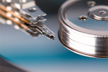 data recovery - Closeup of the details inside a hard drive. Stock Photo - Budget Royalty-Free & Subscription, Code: 400-05310748