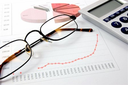 eye glasses images investing - business chart showing financial success and economic growth Stock Photo - Budget Royalty-Free & Subscription, Code: 400-05310879