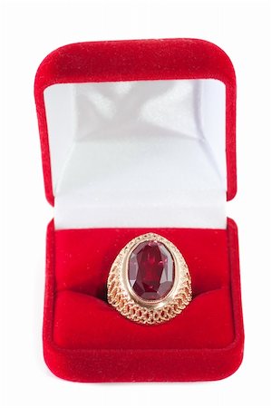 solitaire jewellery - Gift box and ring with red gem inside isolated over white Stock Photo - Budget Royalty-Free & Subscription, Code: 400-05311277