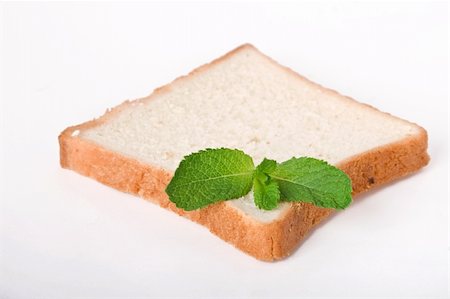 simsearch:400-04626602,k - Slice of bread on white background Stock Photo - Budget Royalty-Free & Subscription, Code: 400-05313094