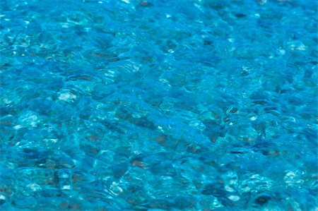 simsearch:600-07784396,k - Flowing vivid blue water abstract background Photographie de stock - Aubaine LD & Abonnement, Code: 400-05313093