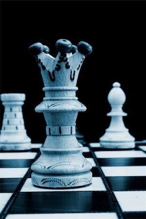 simsearch:640-01351370,k - chess pieces on chess board showing competition success and strategy in business Stock Photo - Budget Royalty-Free & Subscription, Code: 400-05313288