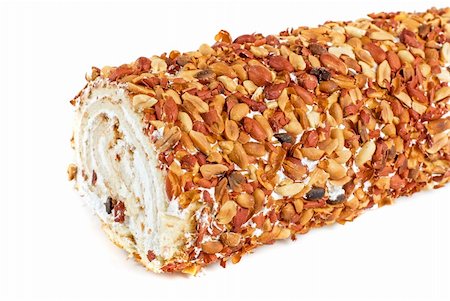 simsearch:400-08506114,k - Nuts Swiss roll closeup isolated on a white background Foto de stock - Super Valor sin royalties y Suscripción, Código: 400-05313387