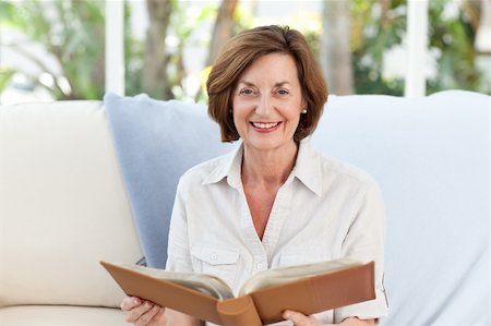 Old woman reading her book Stock Photo - Budget Royalty-Free & Subscription, Code: 400-05313664