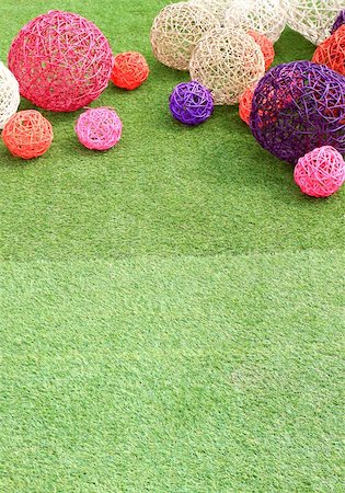 color rattan ball on green grass. Stock Photo - Budget Royalty-Free & Subscription, Code: 400-05313955