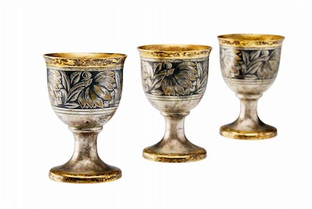 Three ancient wine cup in a line isolated over white background Fotografie stock - Microstock e Abbonamento, Codice: 400-05324009