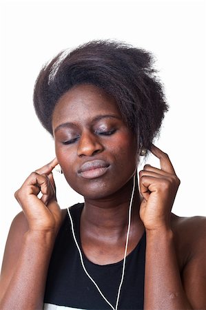 simsearch:400-05321860,k - Beautiful Black Woman Listening Music Foto de stock - Super Valor sin royalties y Suscripción, Código: 400-05324243