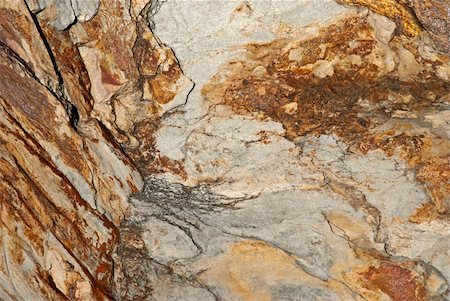 pebble walling - Background texture of earthy colored shale stone Foto de stock - Super Valor sin royalties y Suscripción, Código: 400-05324291