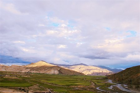 simsearch:400-04552473,k - Landscape of mountains and fields in a cloudy day Stock Photo - Budget Royalty-Free & Subscription, Code: 400-05324508