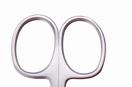 separate paths - Macro view of handle of scissors isolated over white Stock Photo - Budget Royalty-Free & Subscription, Code: 400-05324648