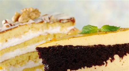 simsearch:400-05341443,k - Lucuma and walnut layer cakes (Selective Focus, Focus on the left front part of the lucuma cake) Stockbilder - Microstock & Abonnement, Bildnummer: 400-05324737