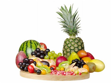 A big variety of exotic fruits on a wooden board (Isolated) Stock Photo - Budget Royalty-Free & Subscription, Code: 400-05324754