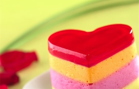Colorful Peruvian heart-shaped jelly-pudding cake called Torta Helada (Very Shallow Depth of Field, Focus on the tip of the cake) Stockbilder - Microstock & Abonnement, Bildnummer: 400-05324784