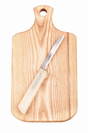 Chopping board with a knife on it Stock Photo - Budget Royalty-Free & Subscription, Code: 400-05324875