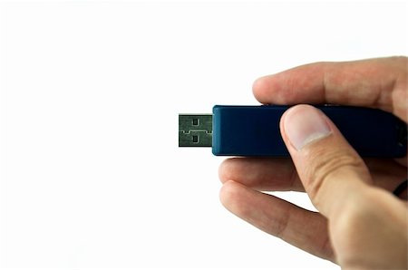 simsearch:400-05919397,k - USB computer memory stick on a white background Fotografie stock - Microstock e Abbonamento, Codice: 400-05325646