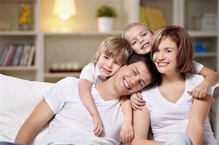 family lamp home - Laughing families with children at home in the evening Stock Photo - Budget Royalty-Free & Subscription, Code: 400-05325862