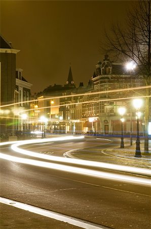 Long shutterspeed in Utrecht, the Netherlands. The trails of the buslights are visible. Stock Photo - Budget Royalty-Free & Subscription, Code: 400-05326256