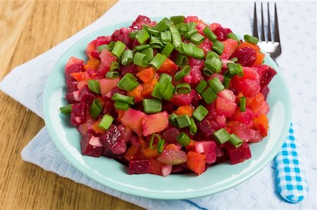 Vinaigrette Russian salad of beetroot, carrot, potato, green leek and olive oil Fotografie stock - Microstock e Abbonamento, Codice: 400-05326378