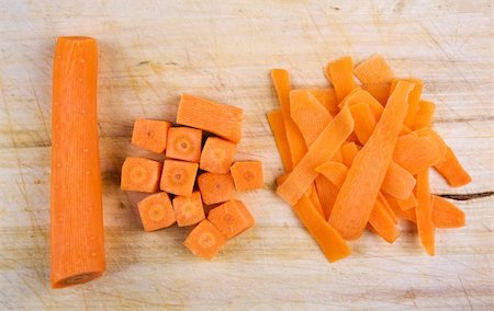 simsearch:400-04347888,k - Chopped carrot for cooking on the rustic wooden board Stockbilder - Microstock & Abonnement, Bildnummer: 400-05326674