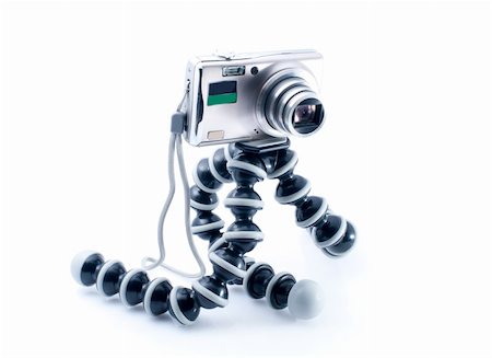 simsearch:400-05179794,k - Small metal Digital photo camera and tripod  on white background Stock Photo - Budget Royalty-Free & Subscription, Code: 400-05326778