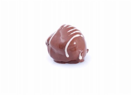 simsearch:400-06142439,k - Chocolate candies. Closeup,isolated on the white Stock Photo - Budget Royalty-Free & Subscription, Code: 400-05326780