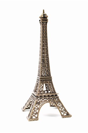 Small bronze copy of Eifel Tower,isolated on white background Foto de stock - Super Valor sin royalties y Suscripción, Código: 400-05326826