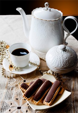 reich (artist) - a cup of coffee and sweets Fotografie stock - Microstock e Abbonamento, Codice: 400-05327019
