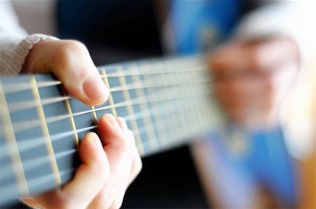 play guitar stage - blue music guitar with blurry copyspace for your text message Stock Photo - Budget Royalty-Free & Subscription, Code: 400-05327208