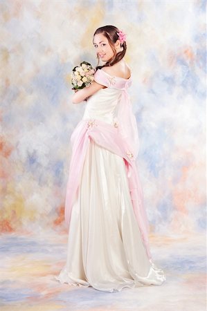 simsearch:400-06694116,k - Beautiful woman dressed as a bride over colored background. Photographie de stock - Aubaine LD & Abonnement, Code: 400-05327286