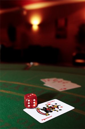 queen of hearts playing card - green casino table with dice on a joker and a hand of a royal flush Stock Photo - Budget Royalty-Free & Subscription, Code: 400-05327425