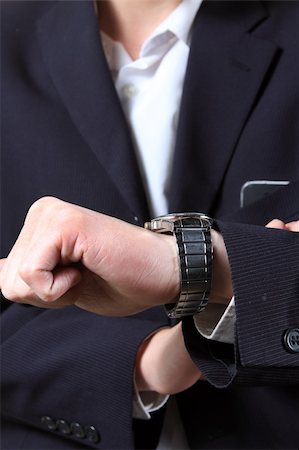 men's hand with a watch. Photographie de stock - Aubaine LD & Abonnement, Code: 400-05327642