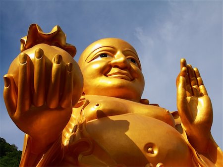 Buddha Fat,Buddha Smiling.buddha with gold bag. Stock Photo - Budget Royalty-Free & Subscription, Code: 400-05327678